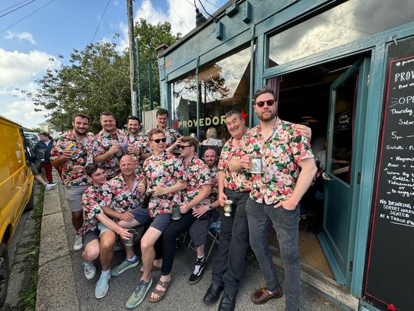 The band posing for a photo